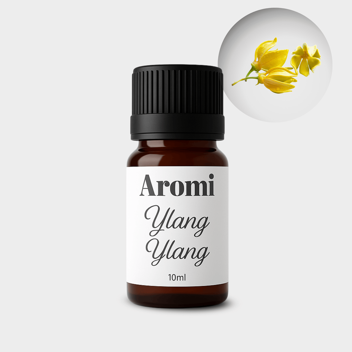 Ylang eterisk olja, frontvy grå bakgrund