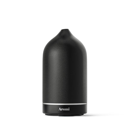 Svart diffuser, vit bakgrund frontvy