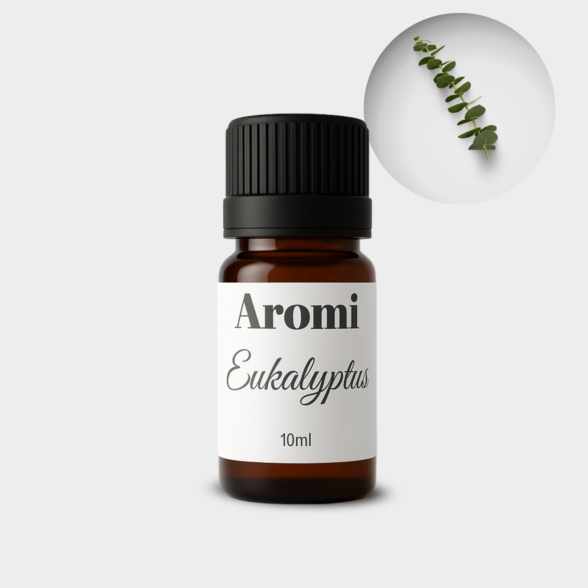 Eukalyptus eterisk olja, frontvy grå bakgrund