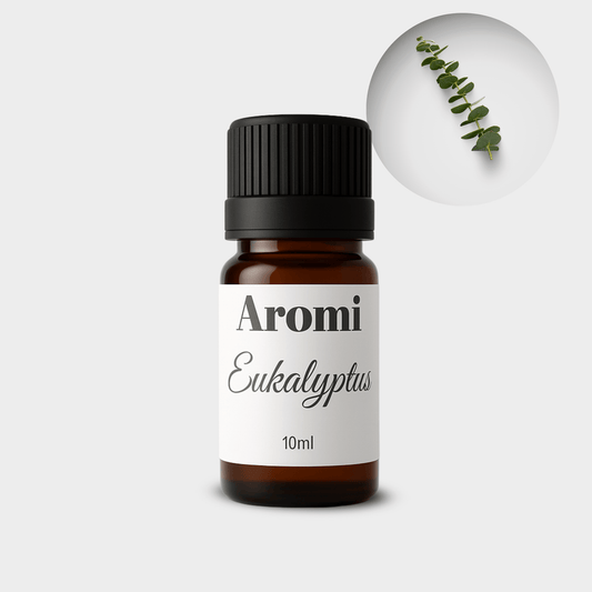 Eukalyptus eterisk olja, frontvy grå bakgrund