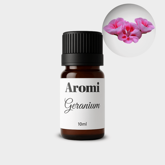 Geranium eterisk olja, frontvy grå bakgrund