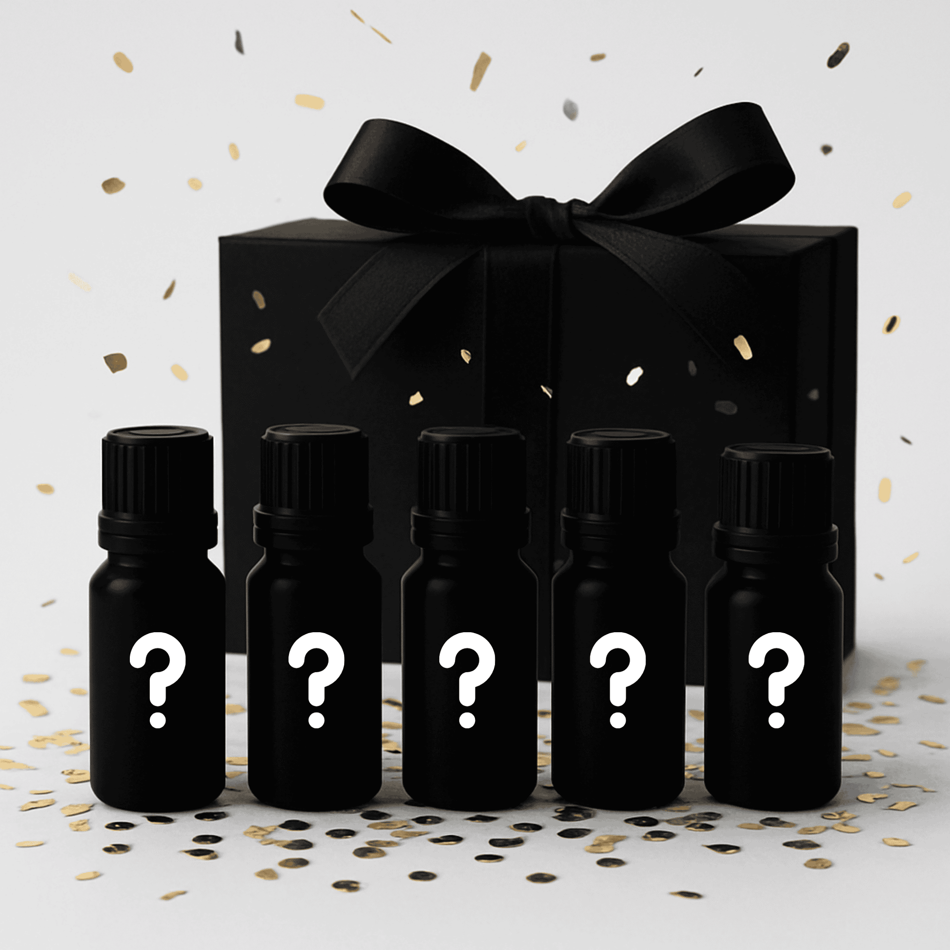 5 doftoljor och gåvolåda, frontvy grå bakgrund