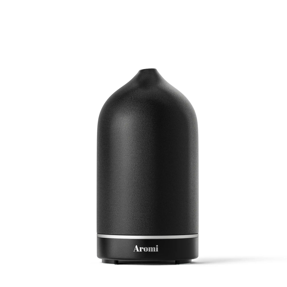 Trådlös kermaisk lyxig diffuser, vit bakgrund frontvy