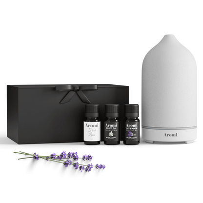 Diffuser och 3 eteriska oljor, frontvy vit bakgrund